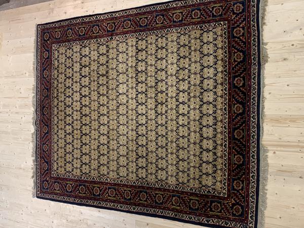 A Turkoman runner with five medallions within geometric borders (117cm x 85cm), £80-120