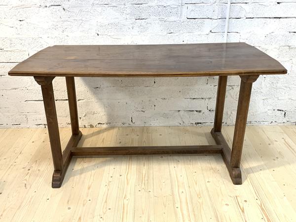 An elm stool with round seat on splay straight square supports united by stretchers (68cm x d.31cm), £40-60