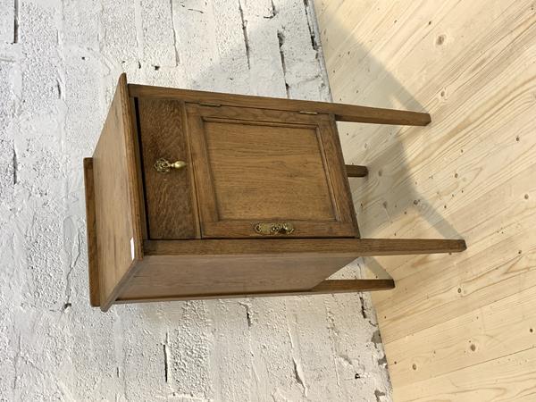 A pine floor standing bookcase, with two adjustable shelves, raised on a plinth base, W134cm, H97cm, D34cm, £50-70