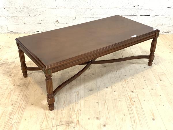 A Victorian walnut framed fender footstool, the upholstered top over pierced and floral carved frieze and supports, H14cm, L116cm, D26cm, £40-60