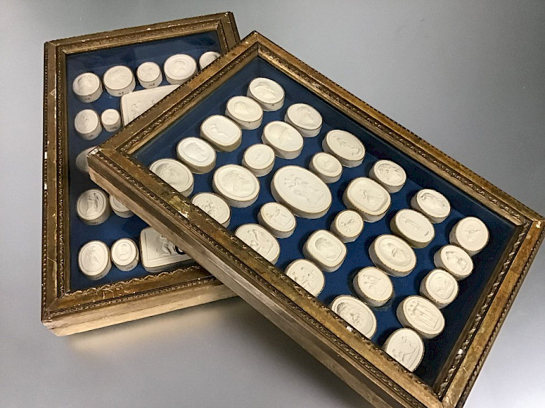 Two box frames containing 18thc/early 19thc intaglios